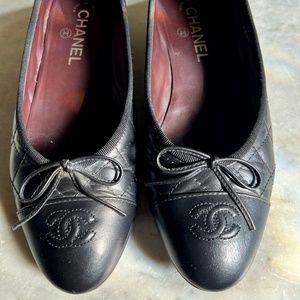 Chanel black quilted flats